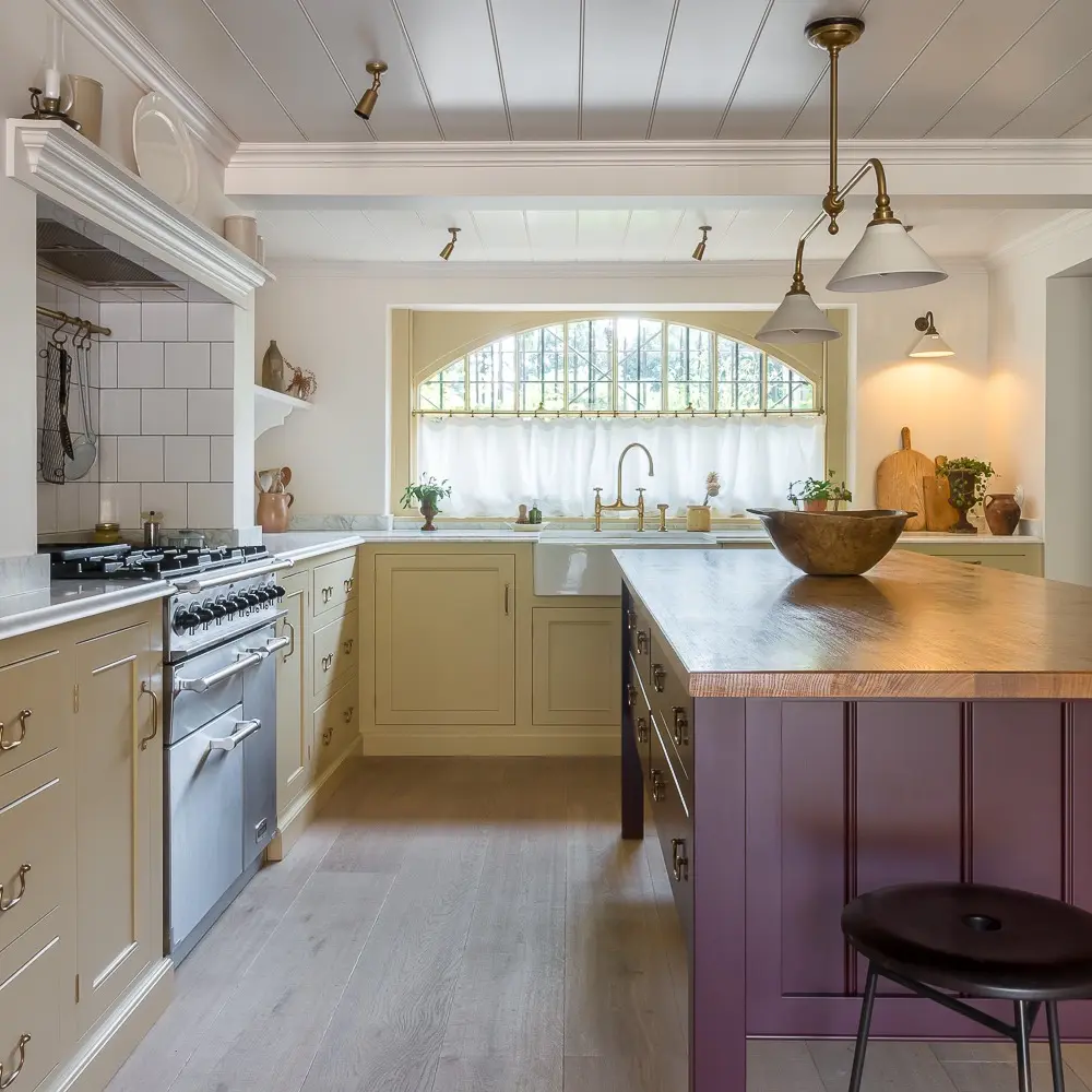 Modern bespoke kitchen installation with marble countertops